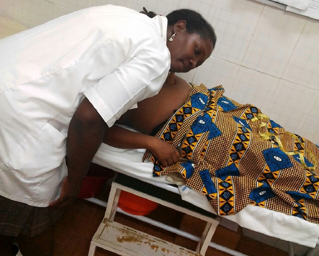 Mozambican Nurse and Patient
